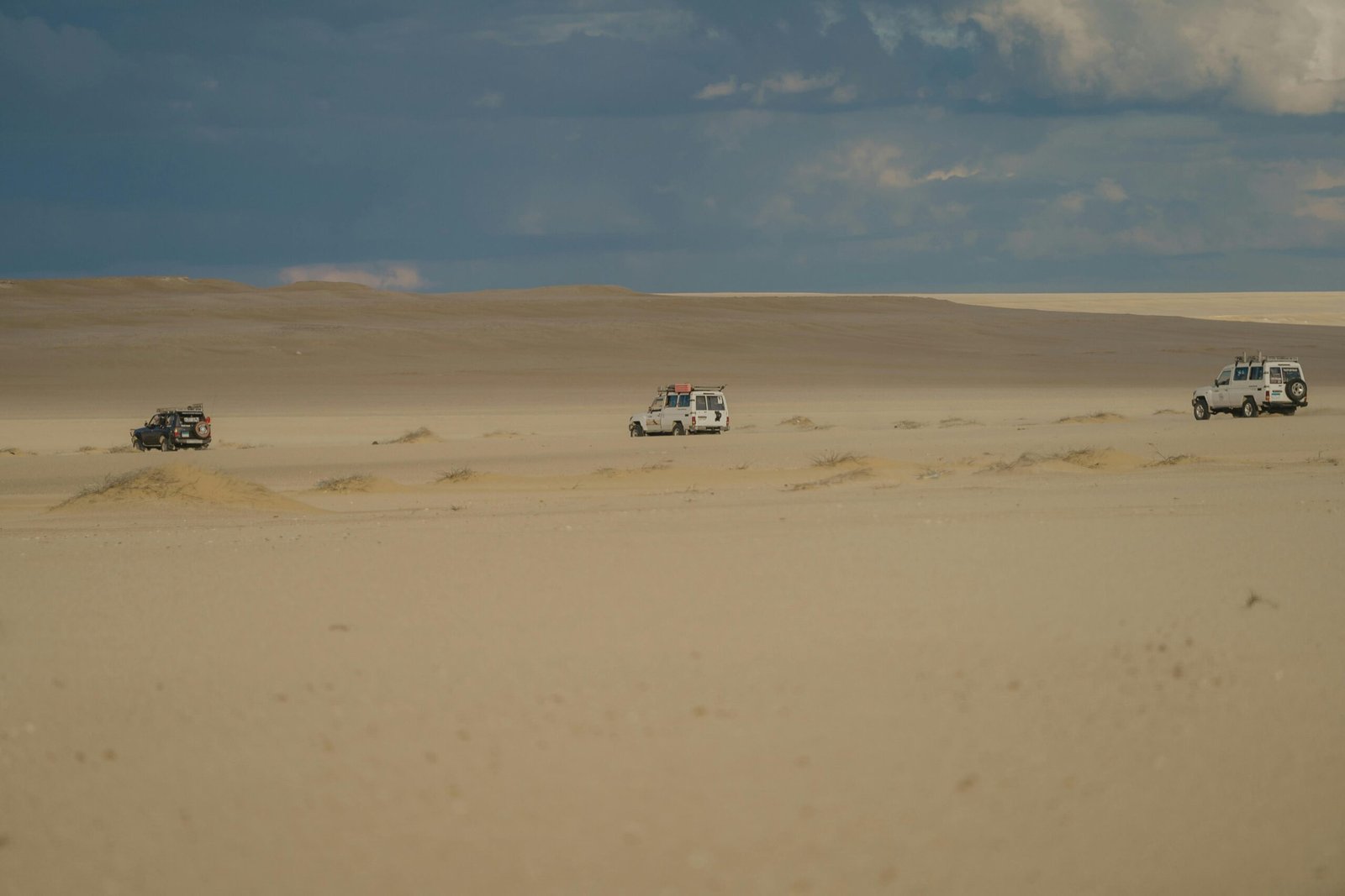 Jeeps safely navigating desert slopes