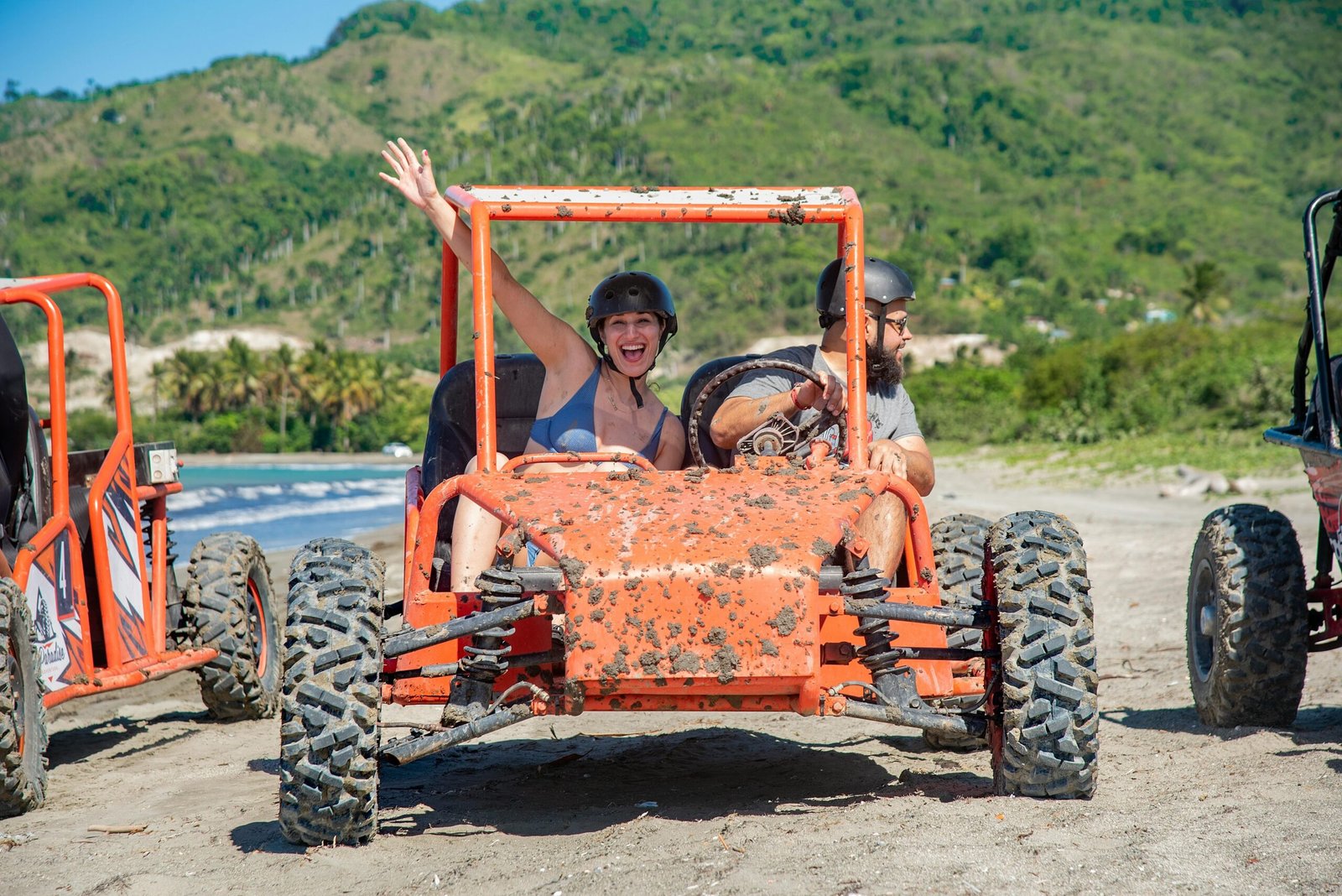 Traveler wearing helmet and goggles before starting a dune buggy ride
