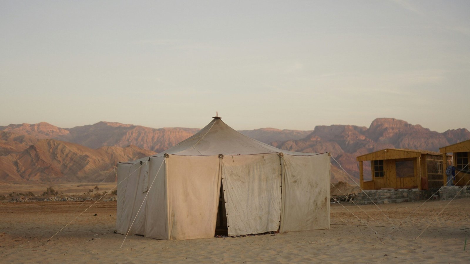 A breathtaking sunset over golden sand dunes in the Sahara