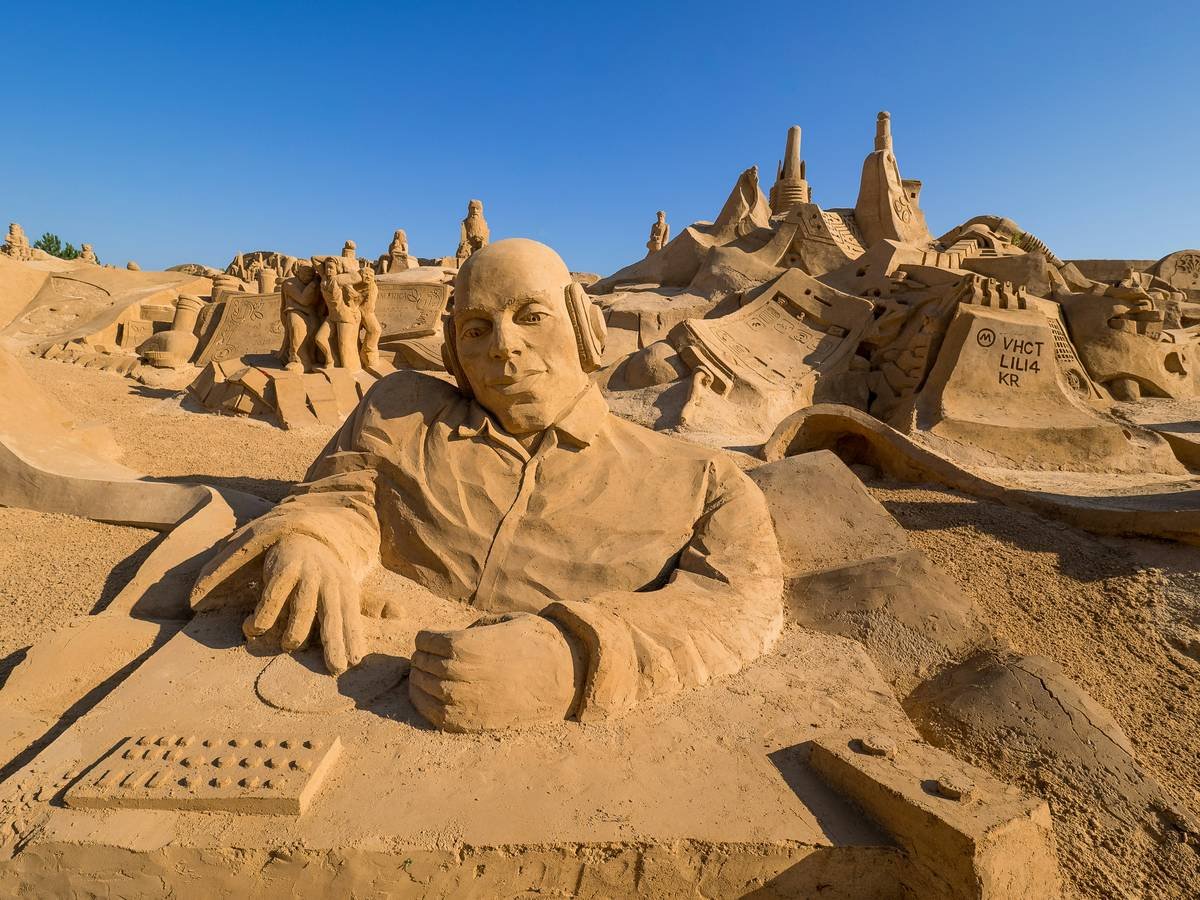 Incredible multi-tiered sand sculpture resembling ancient architecture